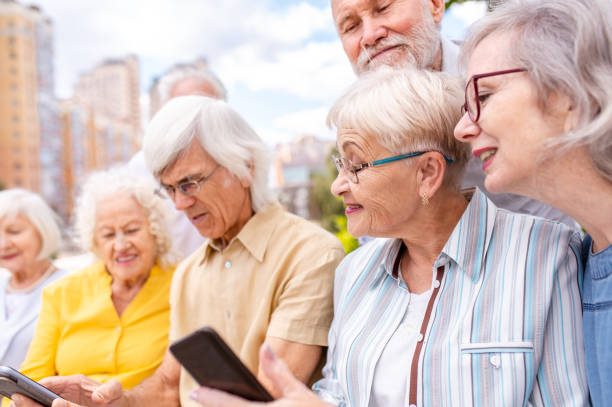 istock Group of seniors people bonding at the park 1431971436