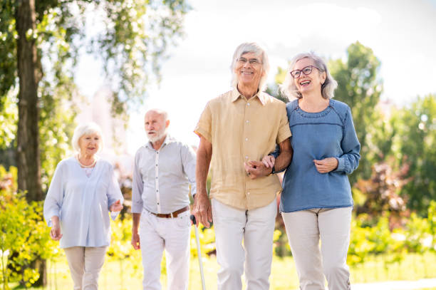 istock Group of seniors people bonding at the park 1431971810