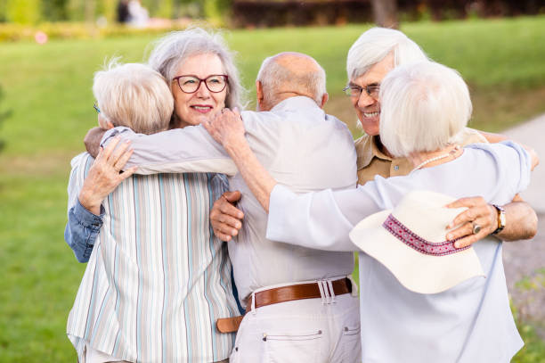 istock Group of seniors people bonding at the park 1431972372