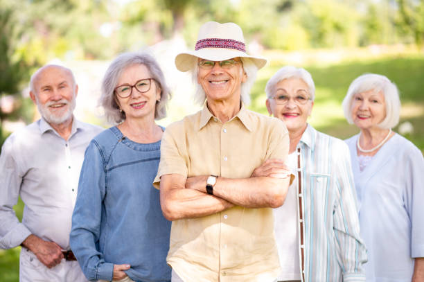 istock Group of seniors people bonding at the park 1431972655
