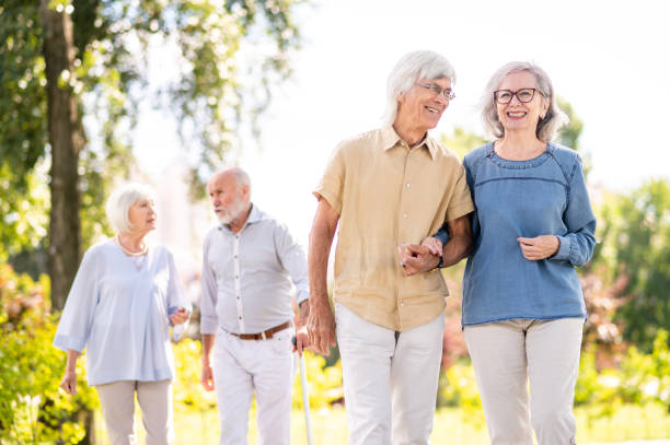 istock Group of seniors people bonding at the park 1431972814