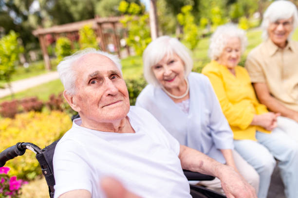 istock Group of seniors people bonding at the park 1431972892