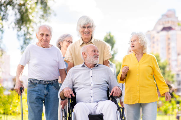 istock Group of seniors people bonding at the park 1431973295