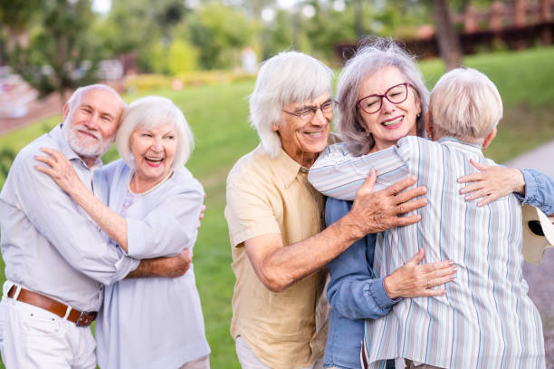 istock Group of seniors people bonding at the park 1431973402