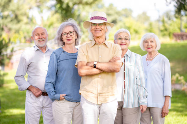 istock Group of seniors people bonding at the park 1431973458