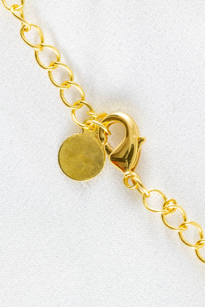 istock Bracelet chain close-up on white 1431974572