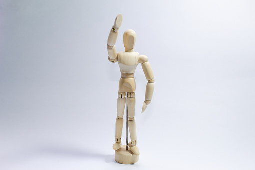 Wooden puppet with white background