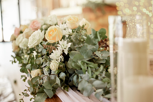 Soft Cream-Colored Roses with Baby's Breath & Greenery in West Palm Beach, Florida.