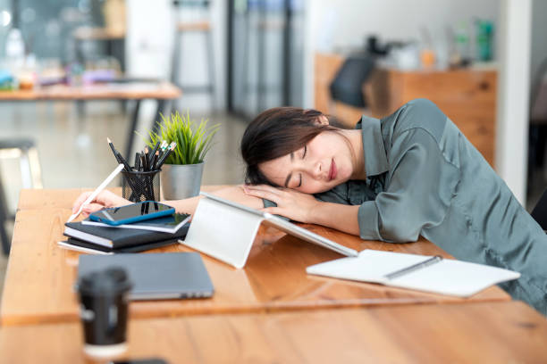 istock Young Asian woman rest eyes from working at the office. 1431987522