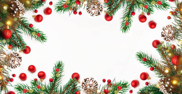 istock Spruce, fir branches, red berries on white background. Frame border. Christmas Ornament composition. Christmas lights. Space for text. Banner. 1431993331