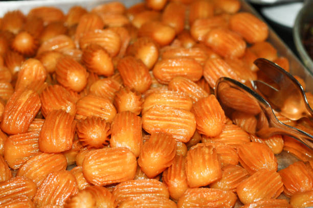 TULUMBA. Traditional Turkish Dessert tulumba with black plate.