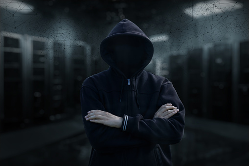 Server Computer Hacker A Hacker Stands In A Server Room Stock Photo - Download Image Now ...