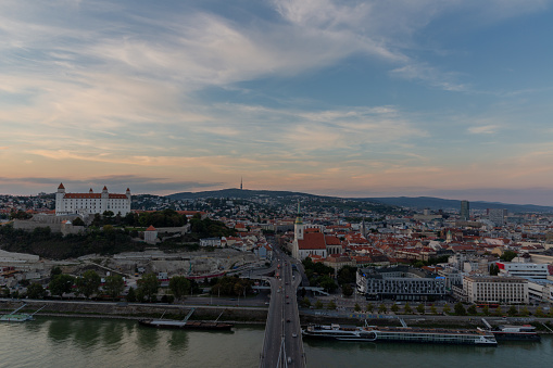 The view of the capital city of Bratislava from the observation deck at sunset