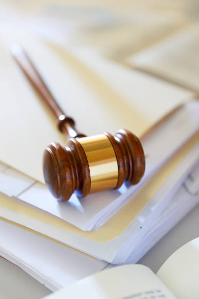 istock Gavel On Top Of Stack of Legal Documents 1431998180