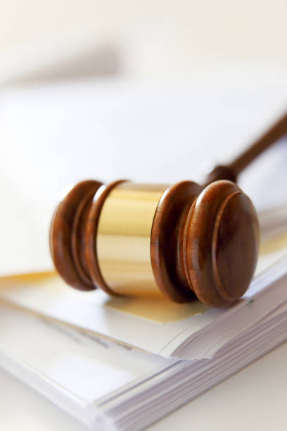istock Gavel On Top Of Stack of Legal Documents 1431998239