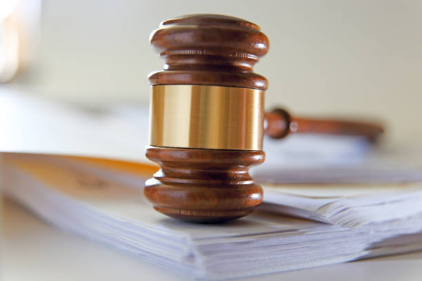 istock Gavel On Top Of Stack of Legal Documents 1431998244