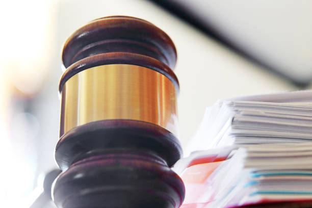 istock Gavel Next To A Stack of Legal Documents 1431998278