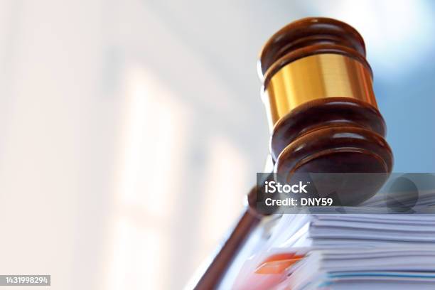 Gavel On Top Of Stack Of Legal Documents Stock Photo - Download Image Now - Legislation, Justice - Concept, Law