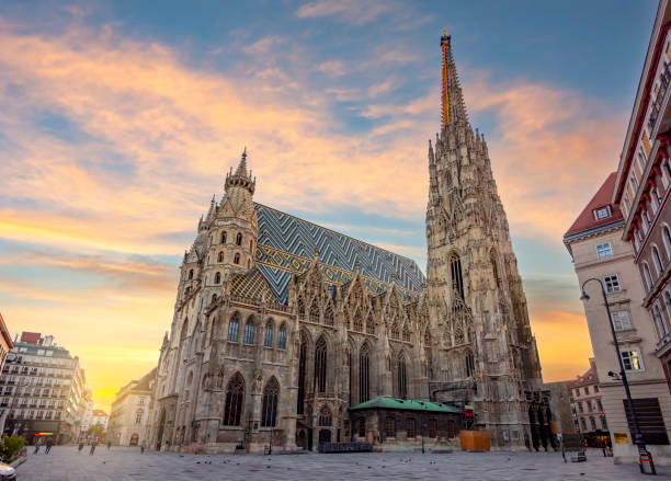 St. Stephen's cathedral on Stephansplatz square at sunrise, Vienna, Austria stock photo