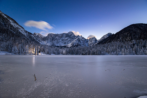 Frosty winter evening at the lakes of Fusine, Friuli Venezia Giulia, Italy