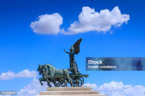 Fatherland In Rome Italy The Quadriga Of Unity On The Summit Of One Of The Two Propylaea The Inscription Hic Manebimus Optime Meaning Well Be Fine Here Stock Photo - Download Image Now