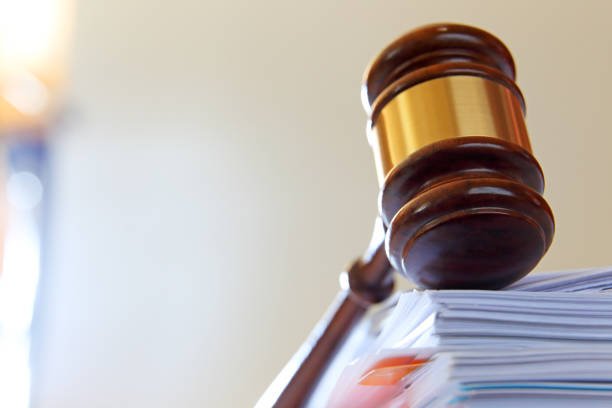 istock Gavel On Top Of Stack of Legal Documents 1432002446