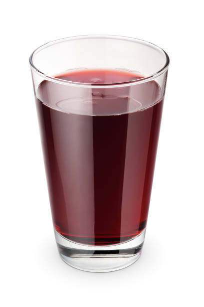 istock Glass of fresh red juice isolated on white. 1432004419