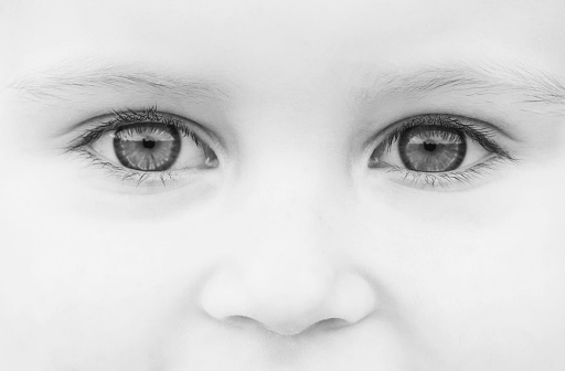 beautiful eyes of the little girl. black and white photo
