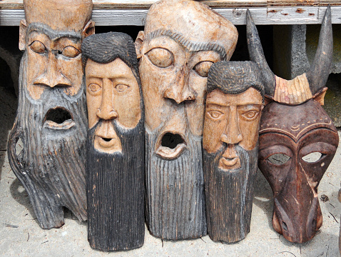 Baie du Cul-de-Sac, Collectivity of Saint Martin / Collectivité de Saint-Martin, French Caribbean: wood carved masks on the beach