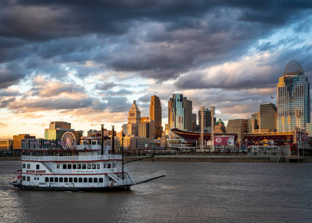 Cincinnati, OH - May 15 2022: the Cincinnati Skyline with a steamboat in the foreground during the summer
