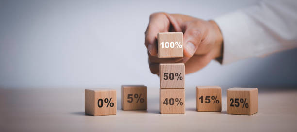 istock Hand chosen cube with check percent symbol printed on its one side, viewed in close-up, Interest rate financial and mortgage rates, Increasing interest rates or discount sale concept,sale and discount 1432010534