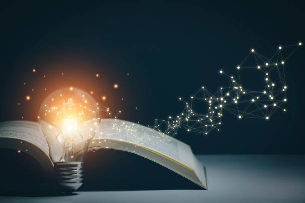 istock Thinking and creative concept, Light bulb on the Book and light bulb style bokeh vintage dark background,Concept The idea of reading books, knowledge, and searching for new ideas. 1432010804