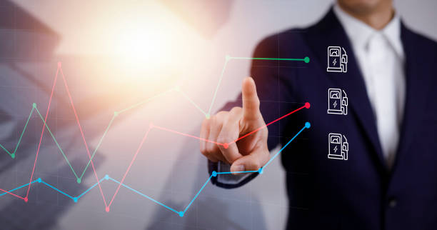Oil energy graph of the world market, impact on the economic concept, Businessman touch chart with the indicator on the oil price slide at a gas station, fluctuations in oil prices and exchange trade. gráfico de energía petrolera del mercado mundial, impacto en el concepto económico, gráfico táctil del empresario con el indicador sobre la caída del precio del petróleo en una gasolinera, fluctuaciones en los precios del petróleo y el comercio de