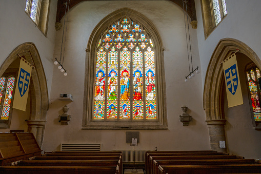 Stained glass Ten Commandments in church.