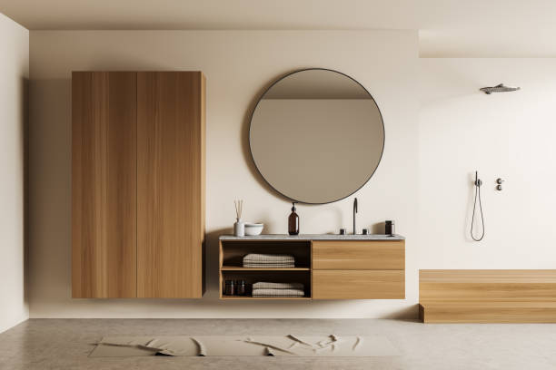 istock Light bathroom interior with sink and douche, dresser with accessories 1432012921