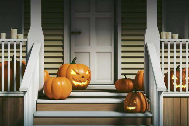 istock Row of pumpkins on the doorstep at nighttime 1432013204