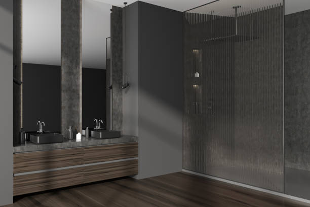 istock Corner view on dark bathroom interior with two mirrors, shower 1432014547