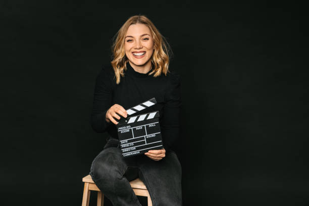The director holding a film slate stock photo
