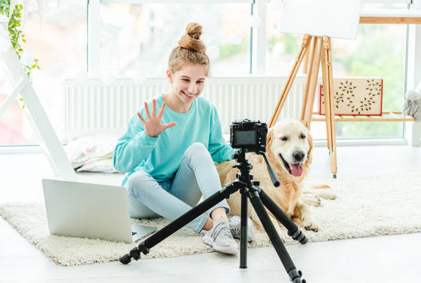 istock Beautiful girl hugging cute dog 1432024083