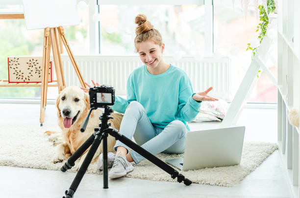 istock Beautiful girl hugging cute dog 1432024085