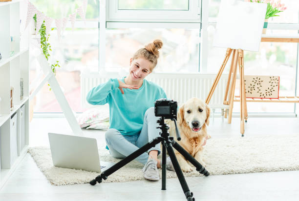 istock Beautiful girl hugging cute dog 1432024088