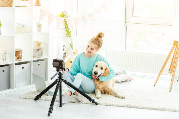 istock Beautiful girl hugging cute dog 1432024096