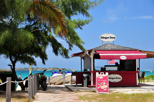 Baie Orientale, Collectivity of Saint Martin / Collectivité de Saint-Martin, French Caribbean: Häagen-Dazs ice cream shack on the water's edge. The Häagen-Dazs manufacturing company was founded in 1960 by the Polish couple Rose and Reuben Mattus in New York City.