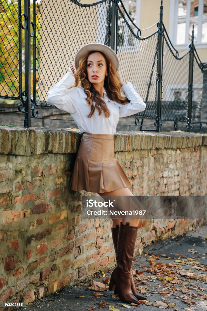 Outdoor Portrait Of Young Beautiful Fashionable Playful Lady Posing Stock  Photo - Download Image Now - iStock
