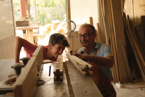 istock master-apprentice relationship to the furniture workshop 1432025917