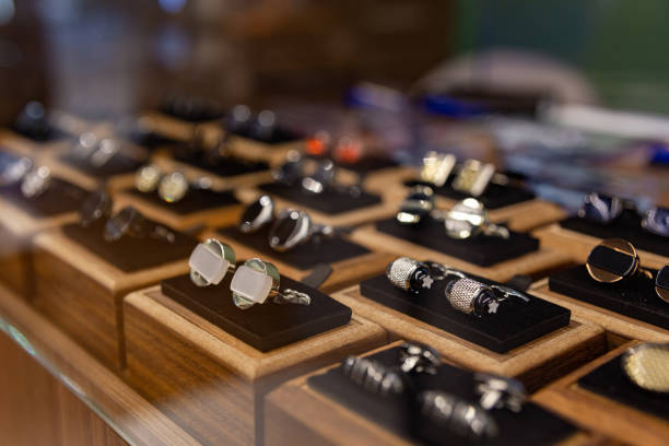 istock Boxes with cufflinks on shelf in boutique. 1432030710