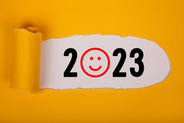 istock Torn Paper With Happy New Year 2023 On White Background 1432035958