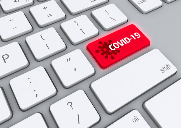 istock A 3D illustration of a computer keyboard with a colored key written COVID-19 1432042485