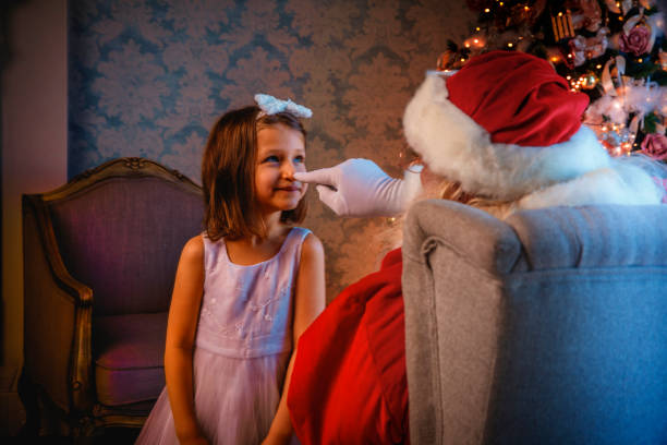 Happy kids opening their Christmas presents