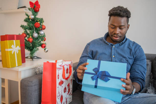 istock Man celebrating Christmas Eve at home 1432058669